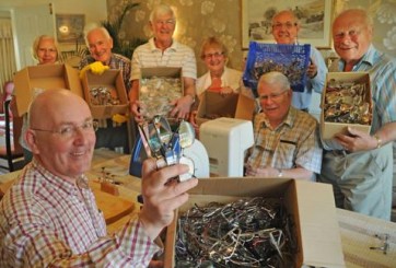 Members of Rotary Club of York Ainsty sorting specs.